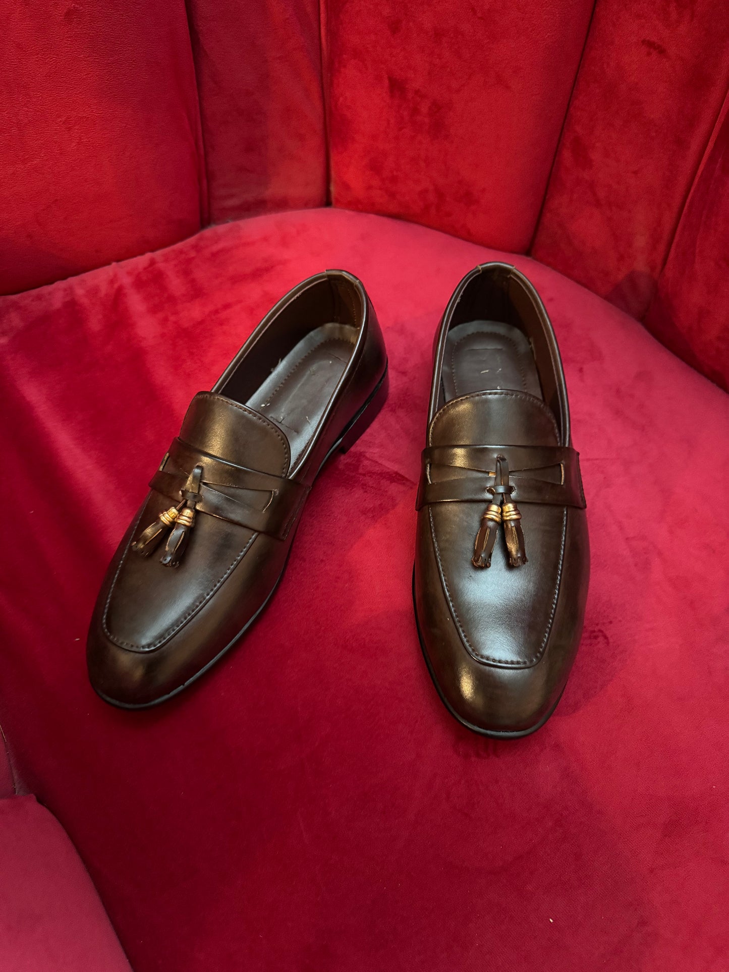 Black tassel shoes